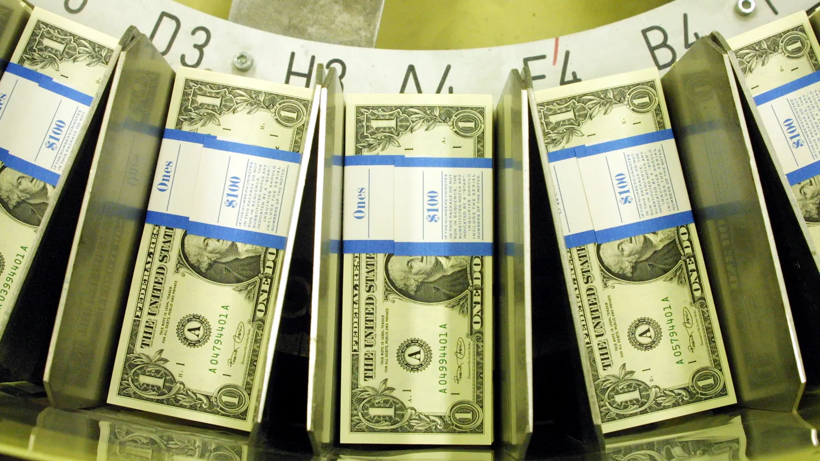 ai-investments-lead-to-job-and-pay-cutbacks-as-companies-race-for-competitive-edge