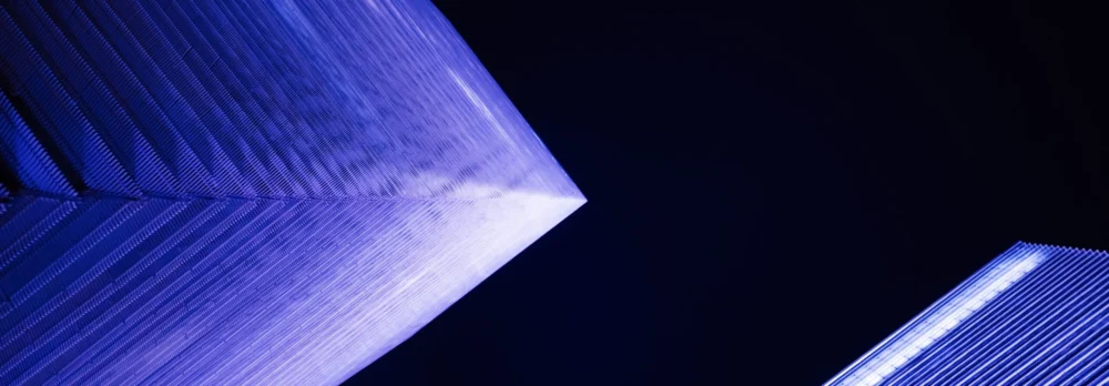 Low-angle view of modern financial buildings at night, Shanghai, China