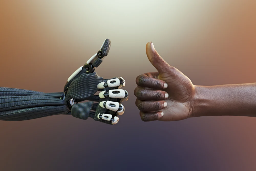 Thumbs up human and robot