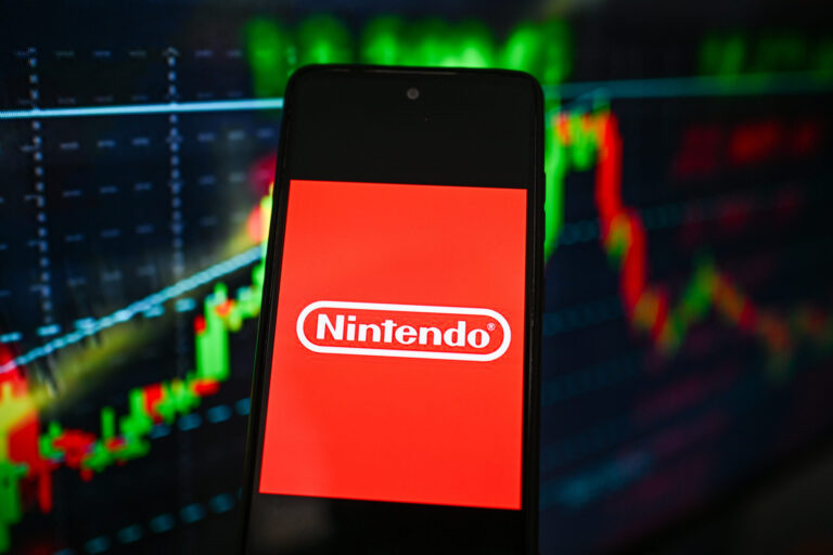 In this photo illustration, a Nintendo logo is seen