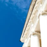 Low angle view of sky and columns Architectural Column Against c