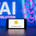In this photo illustration, the Hugging Face logo seen