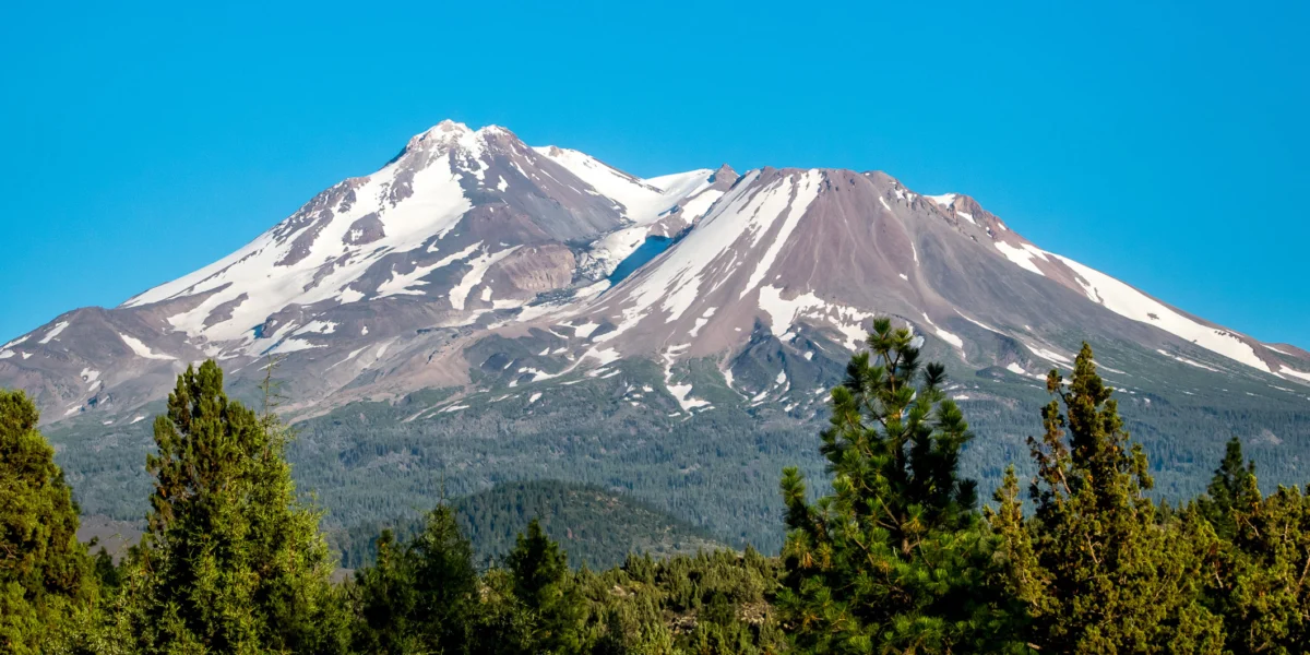 Scenic View Of Mt Shasta Against Clear Blue Sky