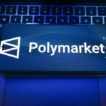 In this photo illustration, a Polymarket logo displayed on a