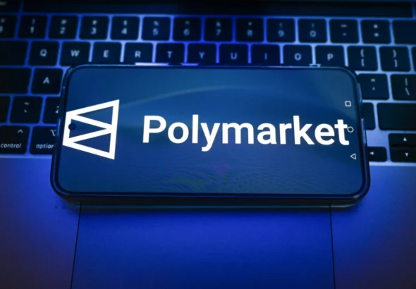 In this photo illustration, a Polymarket logo displayed on a